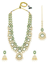 Glistening Nature Necklace Set by Peora. Gold-plated white Kundan necklace set with matching earrings and maang tikka, featuring white beads.