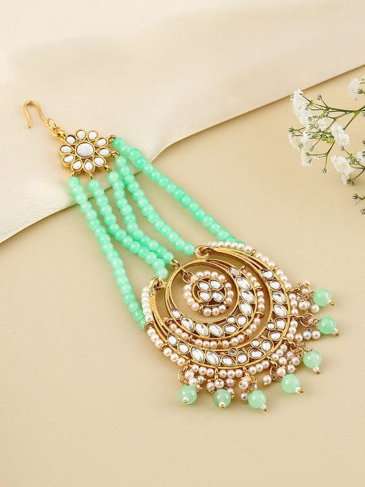Regal Kundan Studded Paso Jewellery. Paso with gold and mint green beads & studded with kundan. Best for your wedding look.