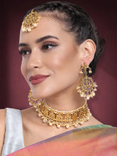 Royal Heritage Pearl Choker Set. Gold kundan & pearl jewellery set with maangtikka and earrings. Best selling & Prefect for your wedding, bridal & special occasion looks.