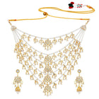 Kundan Cascade in Pearled Glory. Delicate necklace with floral designs. Best for a royal & regal looks. Make your occasion & wedding special with Peora.
