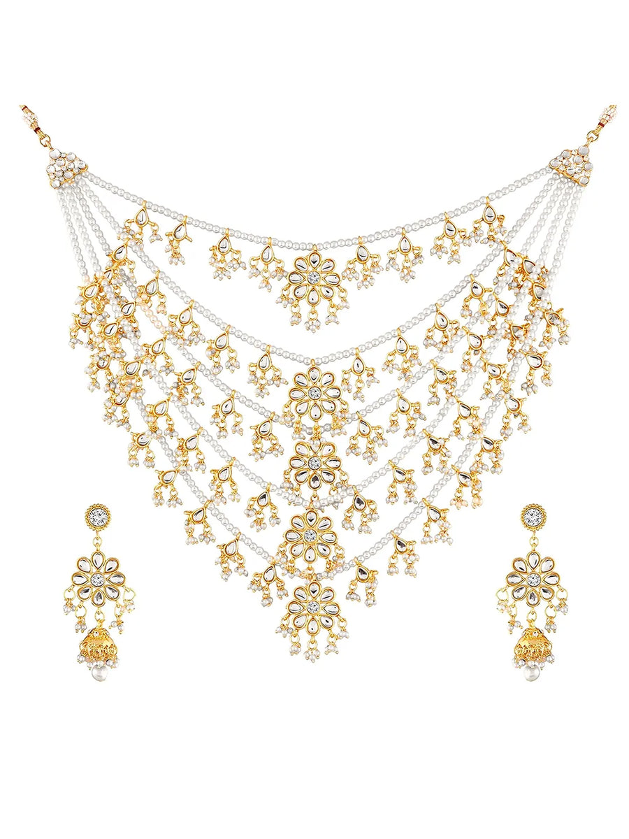 Kundan Cascade in Pearled Glory. Delicate necklace with floral designs. Best for a royal & regal looks. Make your occasion & wedding special with Peora.