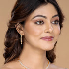 Chic Shine CZ Studded Necklace Set. A gold-plated necklace set with earrings & cubic zirconia stones. 