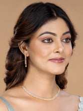 Chic Shine CZ Studded Necklace Set. A gold-plated necklace set with earrings & cubic zirconia stones. 