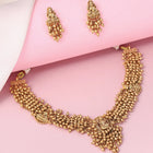 Laxmi Motif Metallic Beads Necklace Set - Gold
