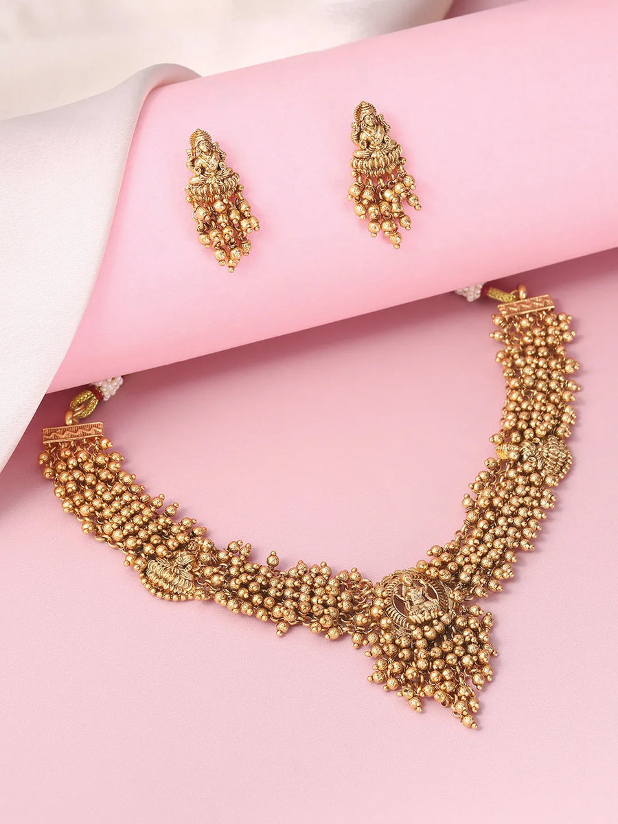 Laxmi Motif Metallic Beads Necklace Set - Gold
