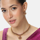 Elegant Faux Ruby Beaded Necklace Set. Gold necklace with pink stones and matching earrings. Best for ethnic, festive wear & special occasion. 