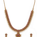 Elegant Faux Ruby Beaded Necklace Set. Gold necklace with pink stones and matching earrings. Best for ethnic, festive wear & special occasion. 