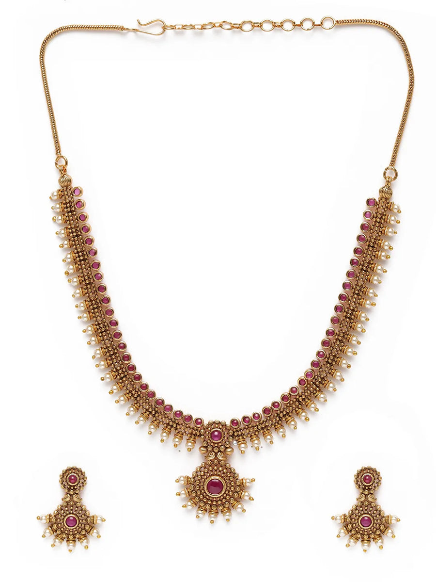 Elegant Faux Ruby Beaded Necklace Set. Gold necklace with pink stones and matching earrings. Best for ethnic, festive wear & special occasion. 