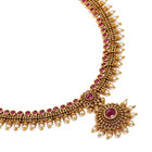 Elegant Faux Ruby Beaded Necklace Set. Gold necklace with pink stones and matching earrings. Best for ethnic, festive wear & special occasion. 