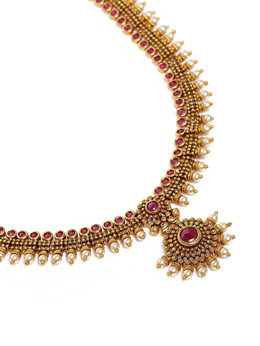 Elegant Faux Ruby Beaded Necklace Set. Gold necklace with pink stones and matching earrings. Best for ethnic, festive wear & special occasion. 