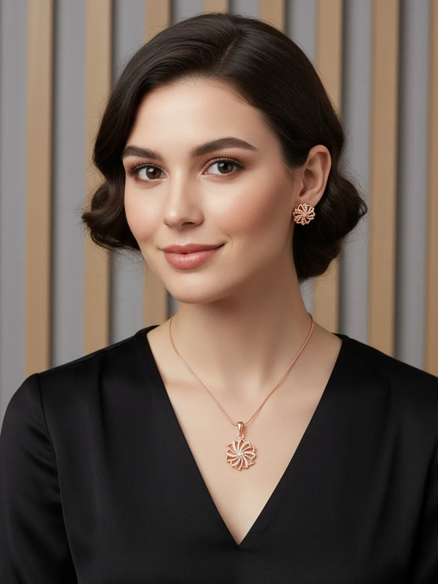 Petite Bloom CZ Floral Pendant Set
 by Peora. Rose gold-plating floral pendant necklace and matching earrings with CZ Stones.
