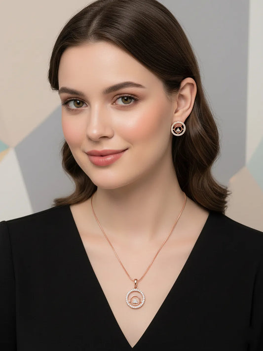 Elegant CZ Round Pendant Orbit Set. Rose gold-plated pendant necklace and a pair of earrings with a round pendant & CZ stones.