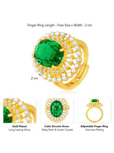 Opulent Green CZ Statement Ring by Peora. Adjustable ring with a gold-plating band and smaller white stones, pearls around the green centrepiece.