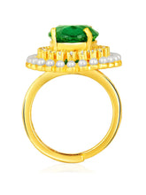 Opulent Green CZ Statement Ring by Peora. Adjustable ring with a gold-plating band and smaller white stones, pearls around the green centrepiece.