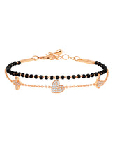 Urban Elegance Rose Gold Charm Bracelet with Black Beads