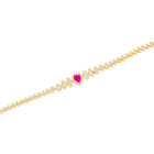 Gold Belly Chain with a heart-shaped pink gemstone on a white background