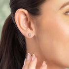 Peora Rose Gold Plated Baguette Crystal Stud Earrings