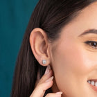 Peora Rhodium Plated Baguette Crystal Stud Earrings