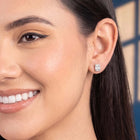 Peora Rhodium Plated Designer Stud Earrings