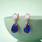 Peora Rose Gold Plated Pear Blue Stone Earrings