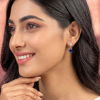 Peora Rhodium Plated Pear Blue Stone Earrings