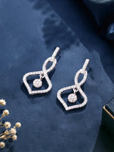 Orbit Charm Earrings Rhodium Plated