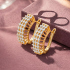 Peora Zircon Sparkle Overload Gold Hoop Huggies