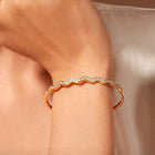 Peora Minimal Wave Edge Gold Kada For Women