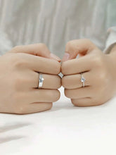 Couple Rings United in Harmonious Love