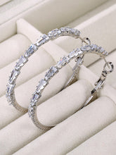 Radiant Hoop with CZ Sparkle. Pair of silver hoop earrings with clear gemstones. Ideal for causal, party wear & daily wear.