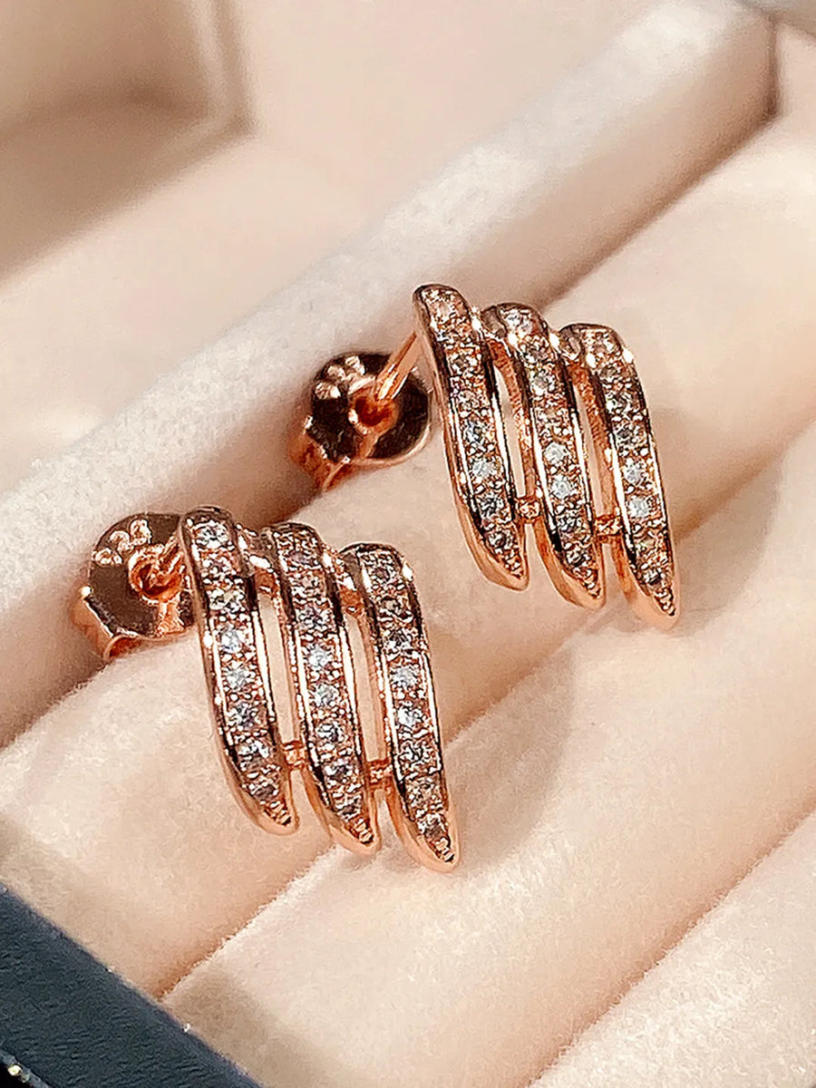 Twilight Spark Cubic Zirconia Hoops | Everyday & Party Wear. Rose gold earrings with diamond accents. Prefect for daily & casual wear.