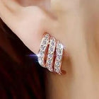 Twilight Spark Cubic Zirconia Hoops | Everyday & Party Wear. Rose gold earrings with diamond accents. Prefect for daily & casual wear.