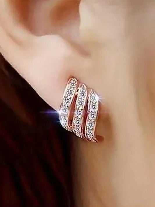 Twilight Spark Cubic Zirconia Hoops | Everyday & Party Wear. Rose gold earrings with diamond accents. Prefect for daily & casual wear.