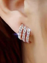 Twilight Spark Cubic Zirconia Hoops | Everyday & Party Wear. Rose gold earrings with diamond accents. Prefect for daily & casual wear.