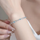 Peora Silver Tennis Nazar Charm Bracelet