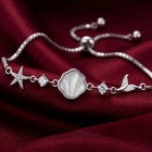 Peora Seashell Charm Bracelet - Silver