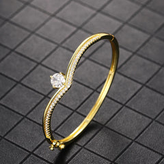 Peora Solitaire Wave Crystal Bangle - Gold
