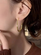 Peora Gold Fluid Shape Hoop Earrings