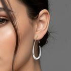 Peora Silver Fluid Shape Hoop Earrings