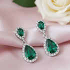 Peora Emerald Drop Halo Silver Earrings