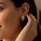 Peora CZ Accent Gold Twist Stud Earrings
