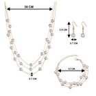 Timeless Glow Pearl Necklace Set featuring white pearls with gold-plated chain, matching bracelet, and earrings