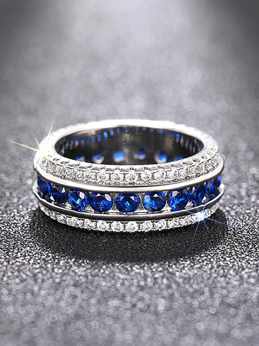 Peora Sapphire Blue CZ Eternity Band Ring - Silver