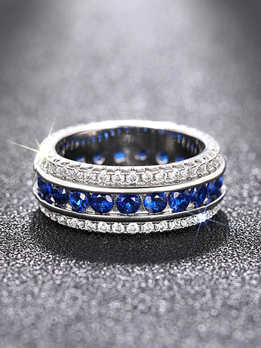 Peora Sapphire Blue CZ Eternity Band Ring - Silver
