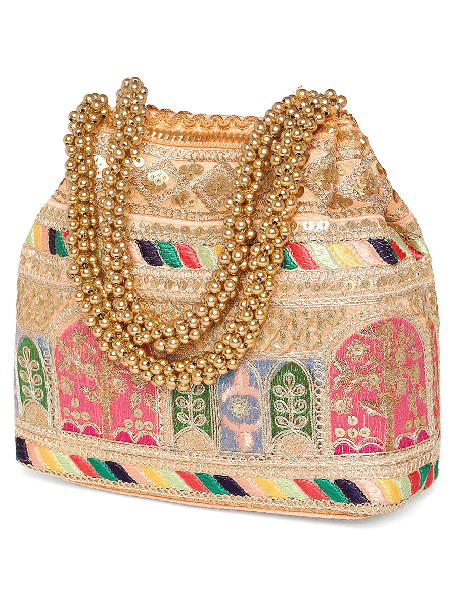 Peach potli bag named Ethnic Embroidered Potli Purse, featuring artificial beads detailing and soft fabric texture | Peora
