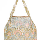 Peach potli bag named Sequin Wave Embellished Potli Bag, featuring artificial beads detailing and soft fabric texture | Peora
