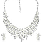 White necklace earrings set crafted from alloy, adorned with cubic zirconia & pearl for an elegant, timeless look | Peora
