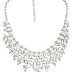 White necklace earrings set crafted from alloy, adorned with cubic zirconia & pearl for an elegant, timeless look | Peora
