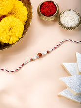Close-up of Spiritual Pearl Rudraksh Silver Rakhi featuring maroon & cream thread, beads work, and rhodium plating – ideal for Raksha Bandhan | Peora
