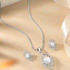 Leafy Luster Pearls and CZ Pendant Set. Silver plating pendant set with pair of earrings, in leaf shape embellished with pearl in centre.